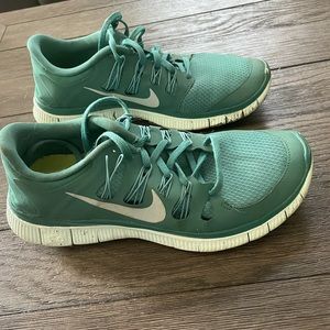 Nike Free in a teal color